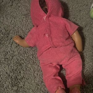 Tollytots limited with a doll